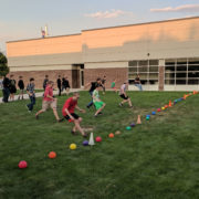 Students racing to the dodge ball lineup