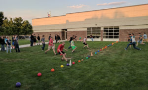 Students racing to the dodge ball lineup